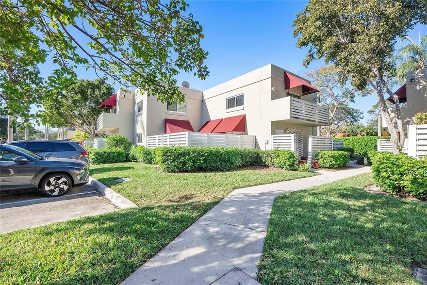 Welcome to this well-maintained 3-bedroom, 2.5-bath townhouse located in the desirable Arbor Courts at Jacaranda community. The home offers a bright and open living area, ideal for both everyday living and entertaining. Hurricane impact windows provide added security and peace of mind. The second floor features a convenient washer and dryer. Enjoy outdoor living in the private, fenced patio—perfect for relaxing or hosting guests. Recent upgrades include a brand-new A/C system and water heater, ensuring year-round comfort and efficiency. Please note chandeliers in the dining room and stairway do not convey. The spacious primary suite serves as a true retreat, complete with a walk-in closet and a private​​‌​​​​‌​‌​​​‌‌​​​‌‌‌​​‌​​‌‌​​​​ balcony.