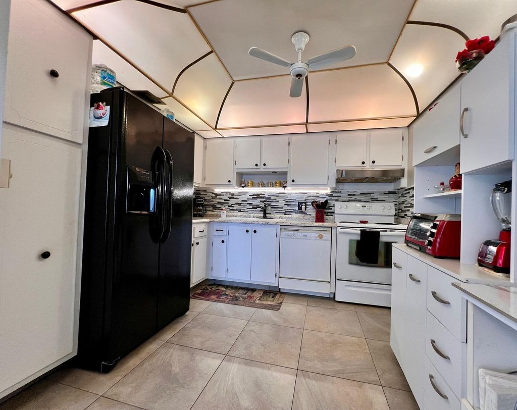 Photo of 303 Wellington C, West Palm Beach, FL 33417 (MLS # R11142974)