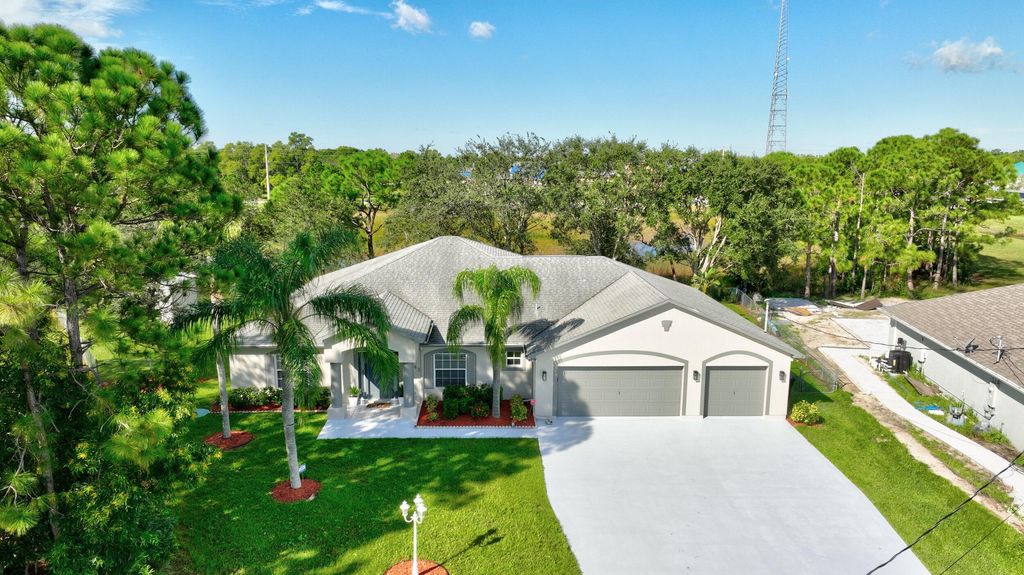 Photo of 6743 NW Mamie Court, Port Saint Lucie, FL 34983 (MLS # R10927920)