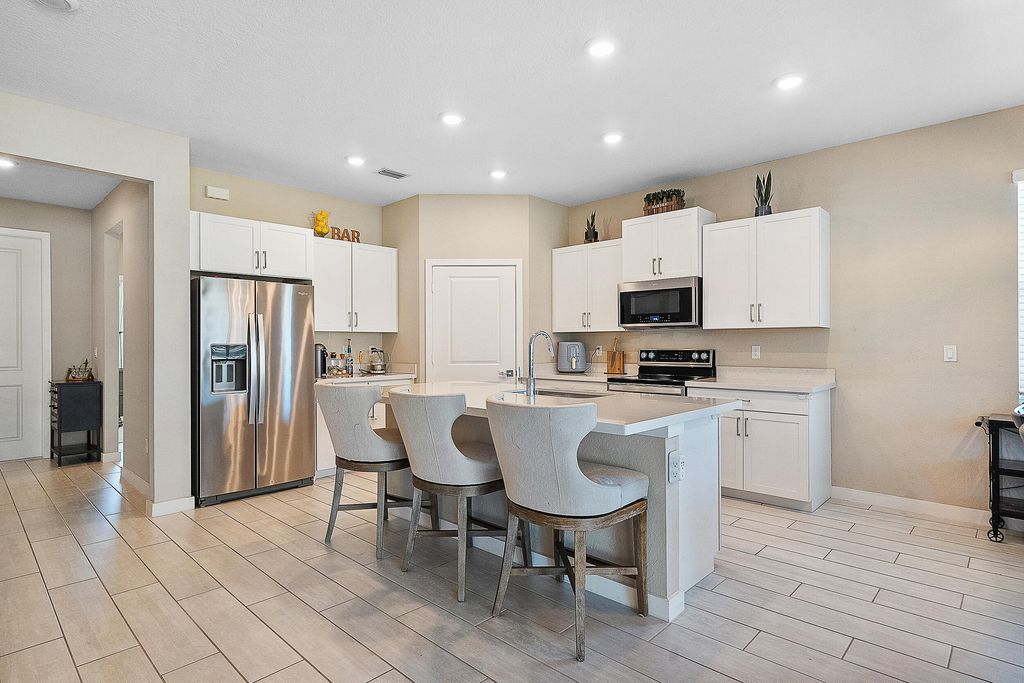 Photo of 2274 SW Strawberry Terrace, Palm City, FL 34990 (MLS # R11072672)