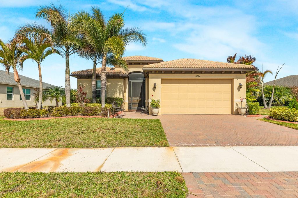 Photo of 11320 SW Lake Park Dr, Port Saint Lucie, FL 34987 (MLS # B26000505)