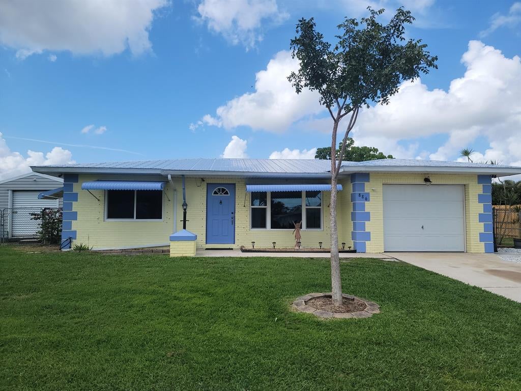 Photo of 886 SW Goodrich Street St, Port St Lucie, FL 34983 (MLS # R10784691)