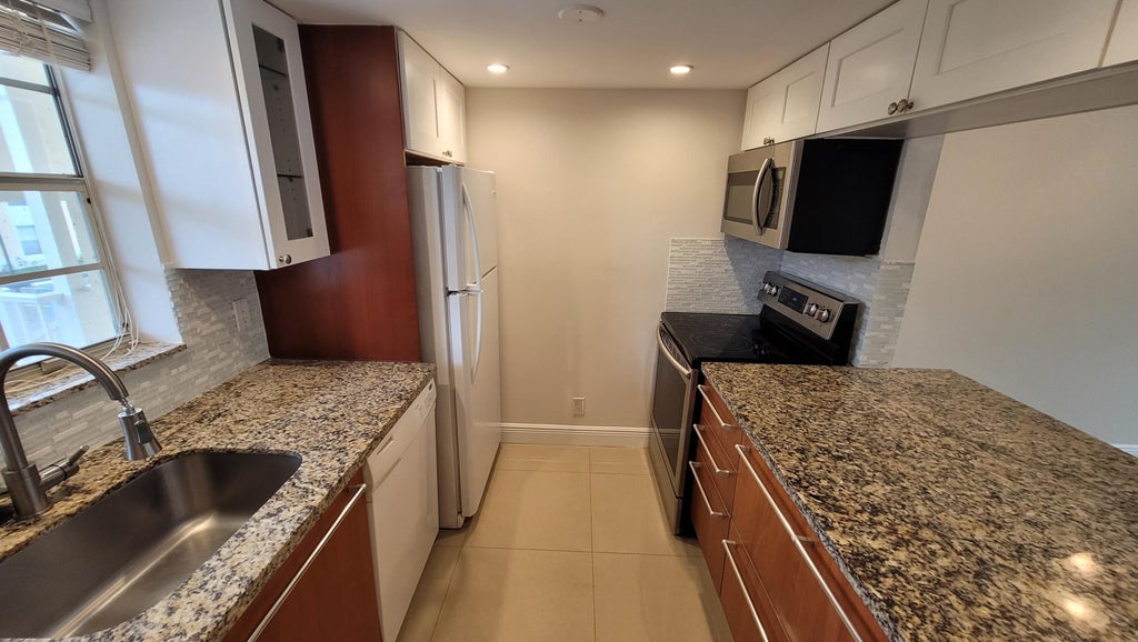 Photo of 6283 La Costa Drive #F, Boca Raton, FL 33433 (MLS # B26073050)