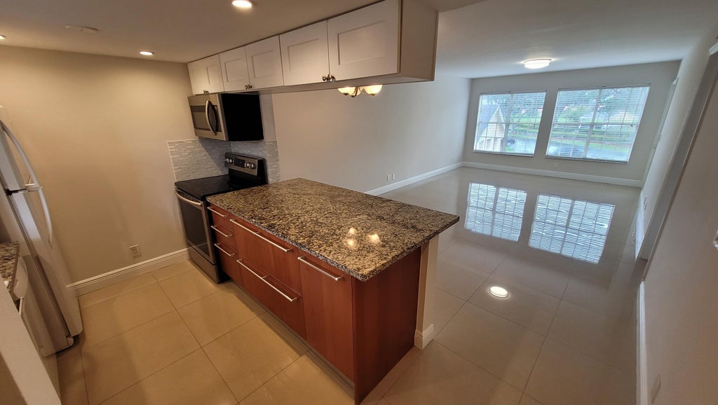 Photo of 6283 La Costa Drive #F, Boca Raton, FL 33433 (MLS # B26073050)