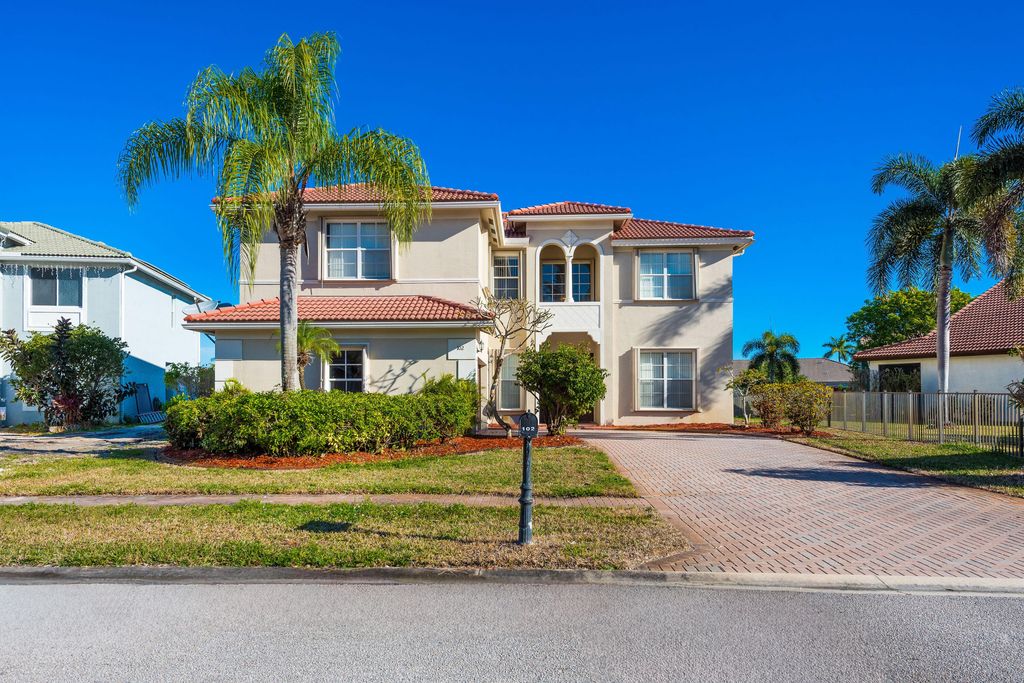 Photo of 102 Ibisca Terrace, Royal Palm Beach, FL 33411 (MLS # B26008902)