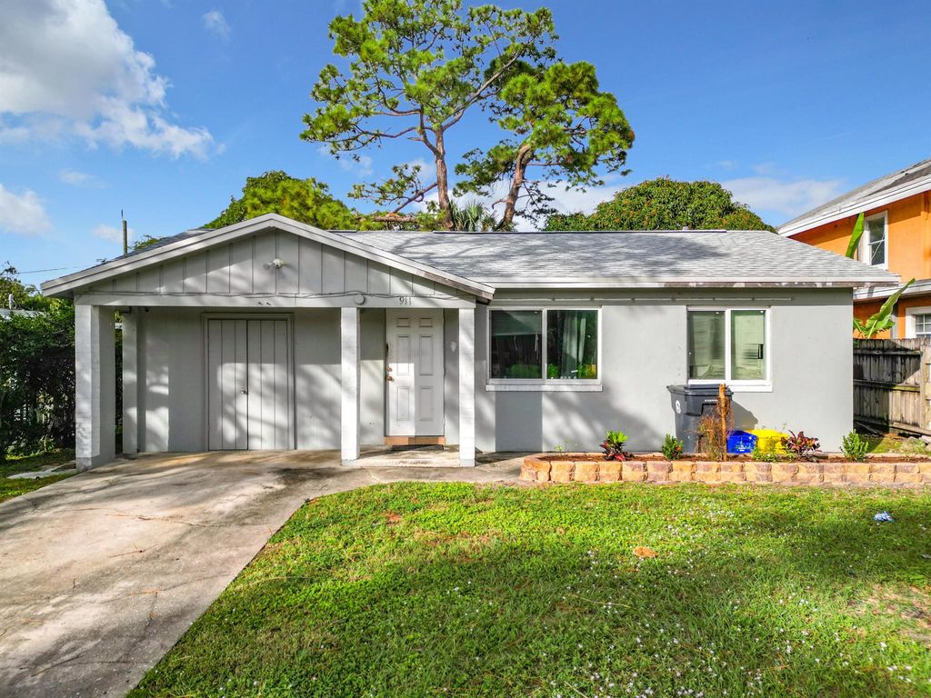 Photo of 911 Rudolf Road, Lake Worth, FL 33461 (MLS # R10945891)