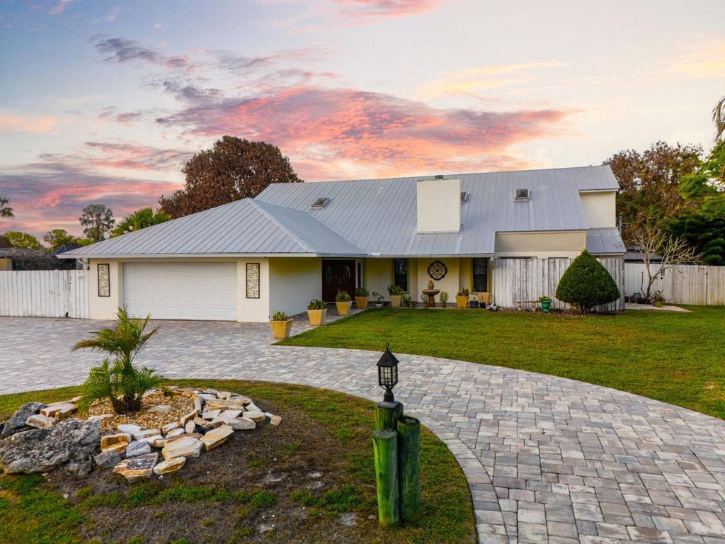 Photo of 147 NE Naranja Avenue, Port Saint Lucie, FL 34983 (MLS # R11103243)