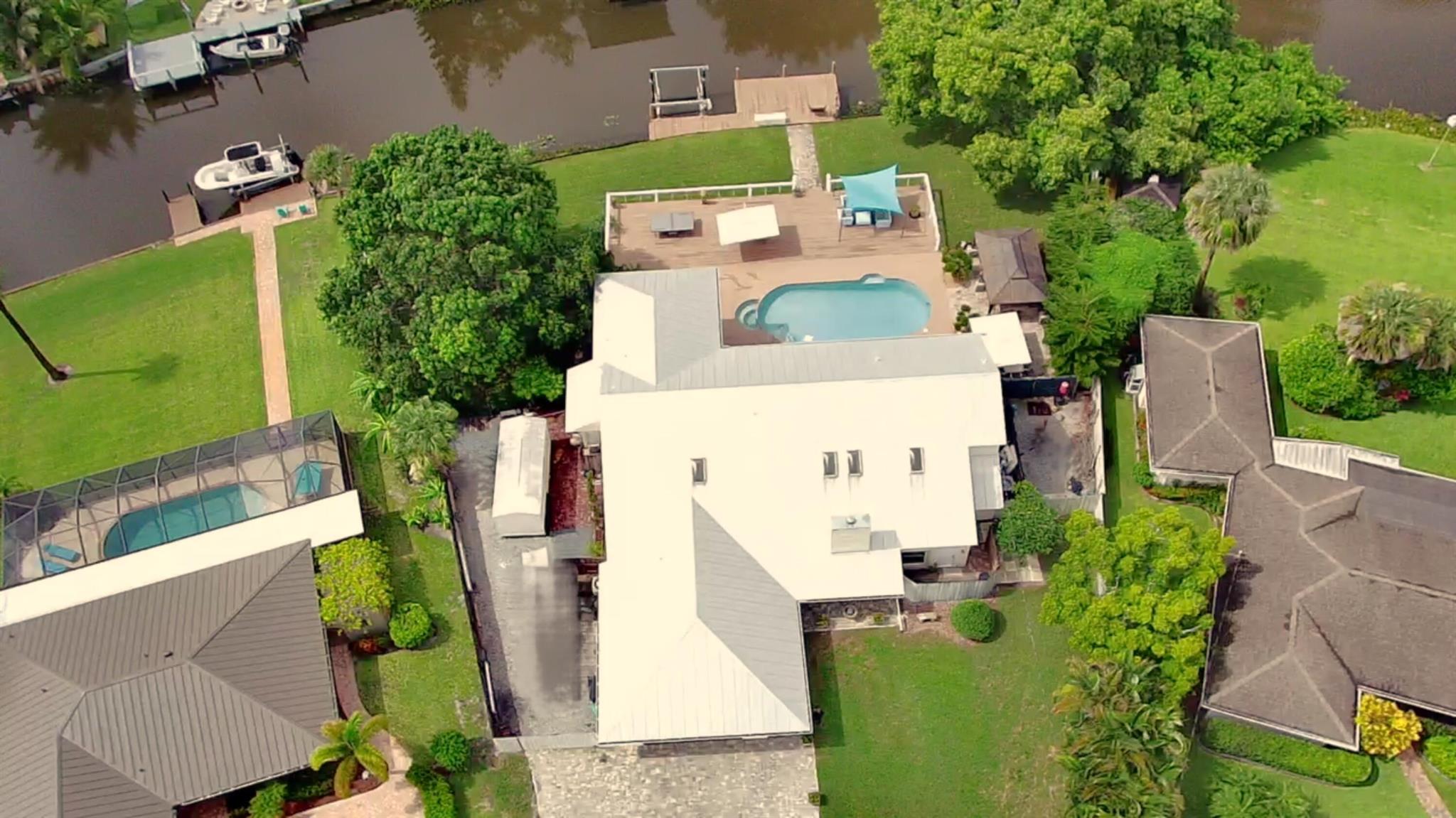 Request Your Private Tour. Welcome to One of Port St. Lucie's Best-Kept Secrets. Rare NO HOA. Where curbside modesty gives way to an OCEAN access. Premium upgrades, custom finishes, and unrestricted boating to the Atlantic. This home is built for multi-lifestyle flexibility: full-time residence, luxury vacation rental, multi-generational living, or a turnkey investment with dual utility. Waterfront Living Ocean Access Estate on 0.41 Acres 6 Beds 4.2 Baths 4,099 Sq Ft Dock + Boat Lift. Airbnb-Ready SuiteIdeally situated near major corridors yet tucked away in a peaceful ocean access setting with and unrestricted boat access to the open ocean. Stacked with premium upgrades and custom details at every turn. Crypto Ready.