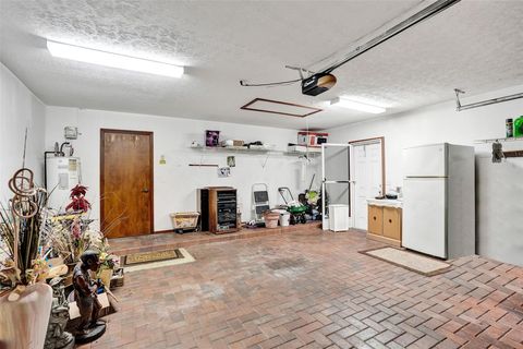 Photo of 766 SE Cavern Ave, Port Saint Lucie, FL 34983 (MLS # F10538379)