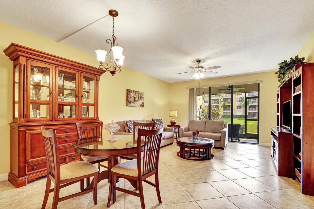Photo of 100 Uno Lago Drive #104, Juno Beach, FL 33408 (MLS # R11094504)