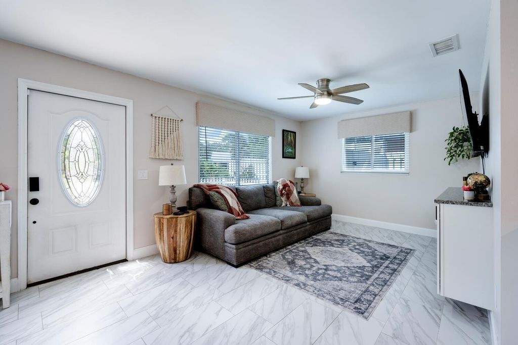 Photo of 1467 SW Peninsula Lane, Palm City, FL 34990 (MLS # B26006186)