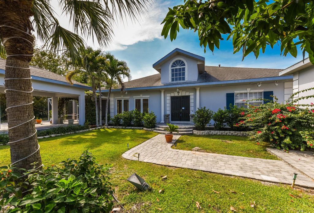 Photo of 11900 SE Plutus Avenue, Hobe Sound, FL 33455 (MLS # R10894374)