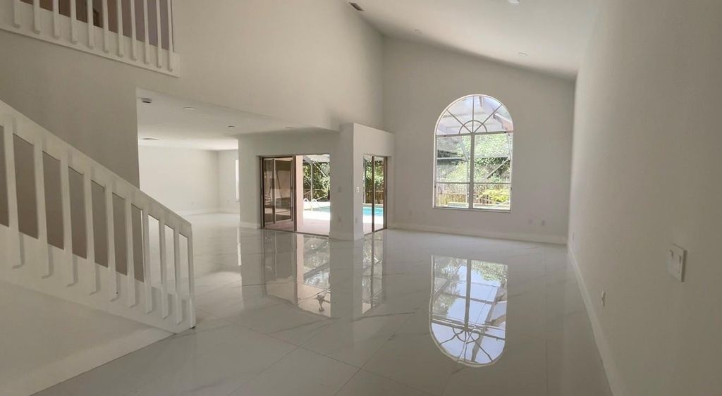 Photo of 6805 NW 75th Place, Parkland, FL 33067 (MLS # F10500889)