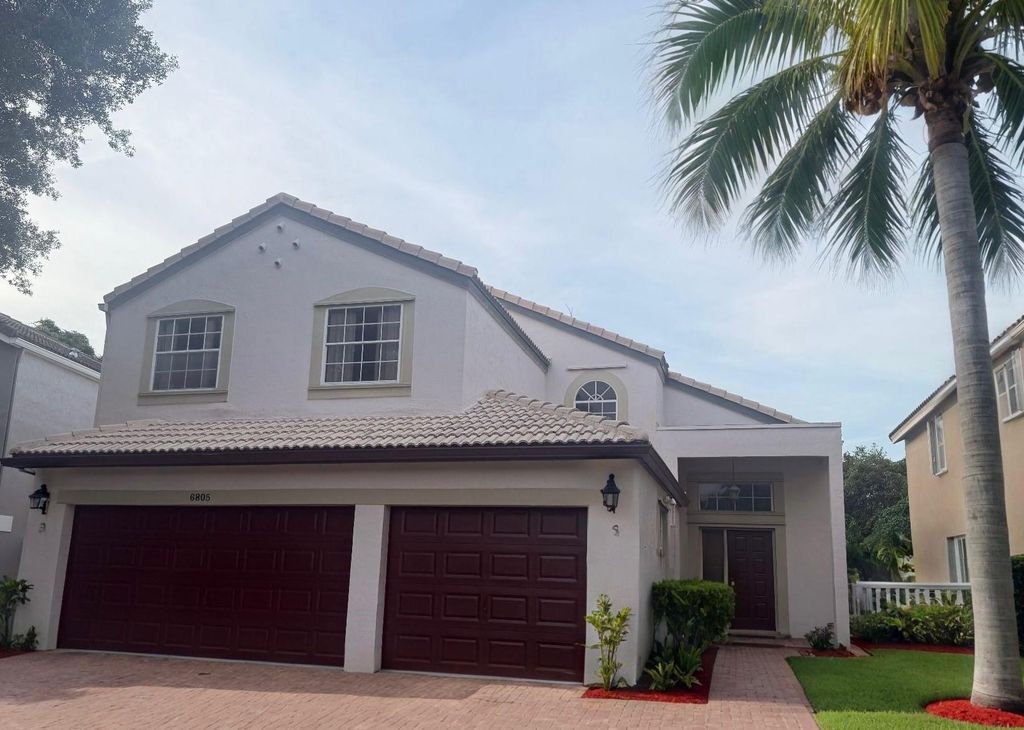 Photo of 6805 NW 75th Pl, Parkland, FL 33067 (MLS # F10500889)