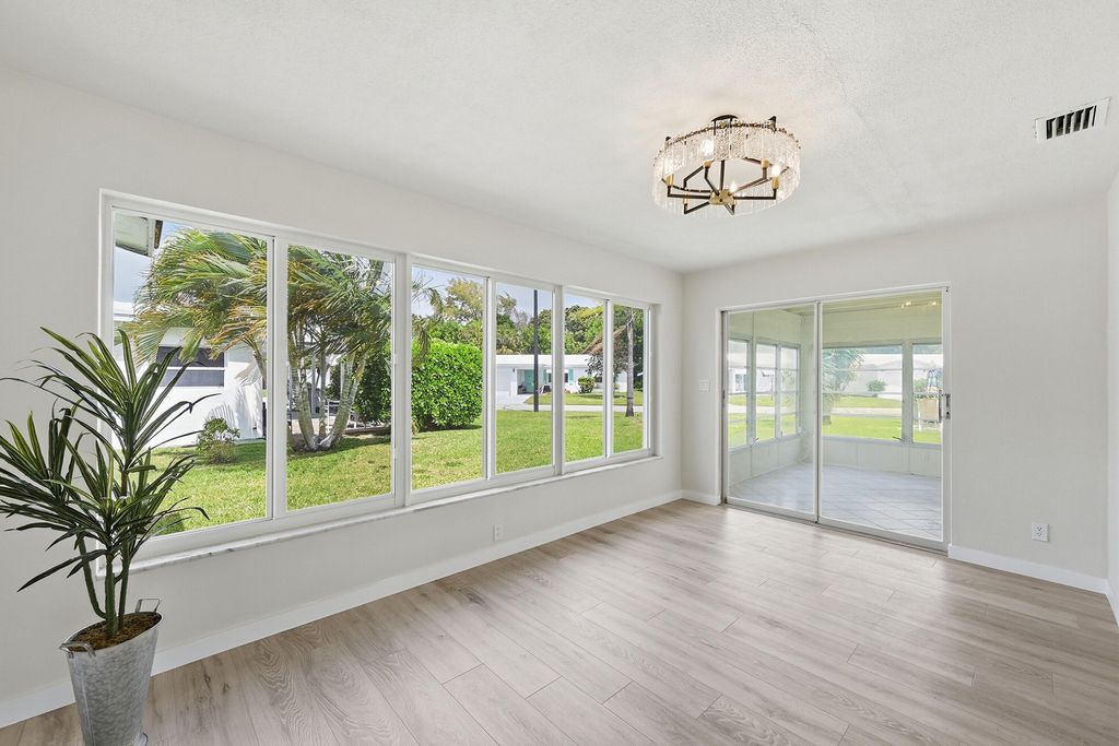 Photo of 2631 W Golf Boulevard, Pompano Beach, FL 33064 (MLS # B26014623)