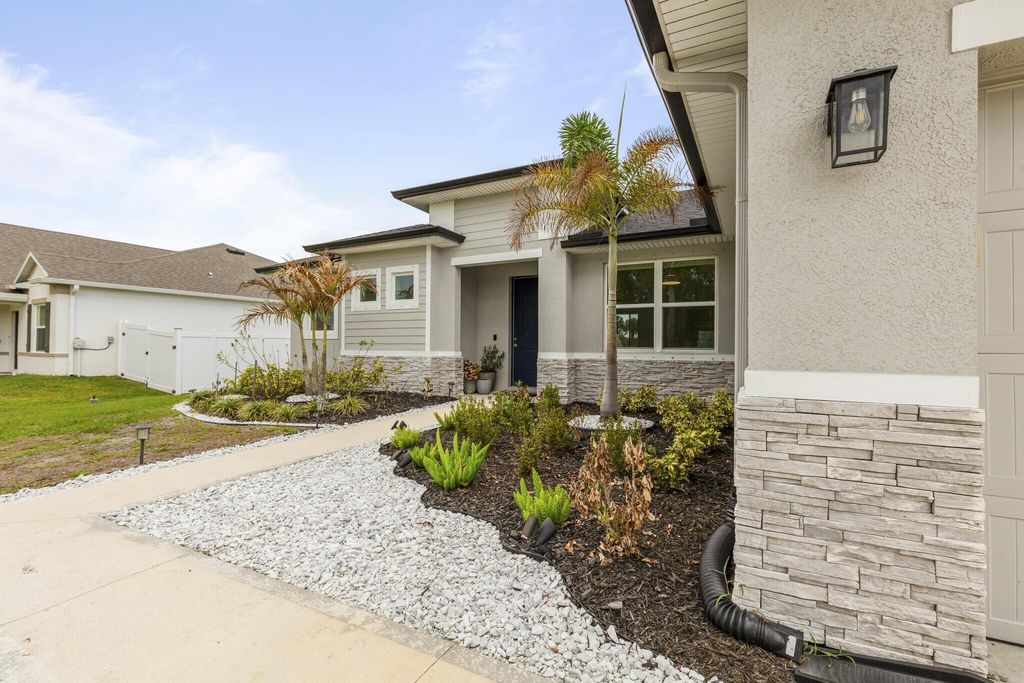 Photo of 2097 SW Import Drive, Port Saint Lucie, FL 34953 (MLS # B26004183)