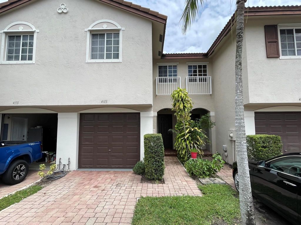 Photo of 4113 Napoli Lake Drive, Riviera Beach, FL 33410 (MLS # R10949048)