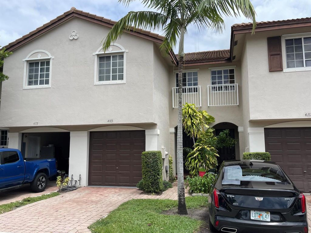 Photo of 4113 Napoli Lake Drive, Riviera Beach, FL 33410 (MLS # R10949048)