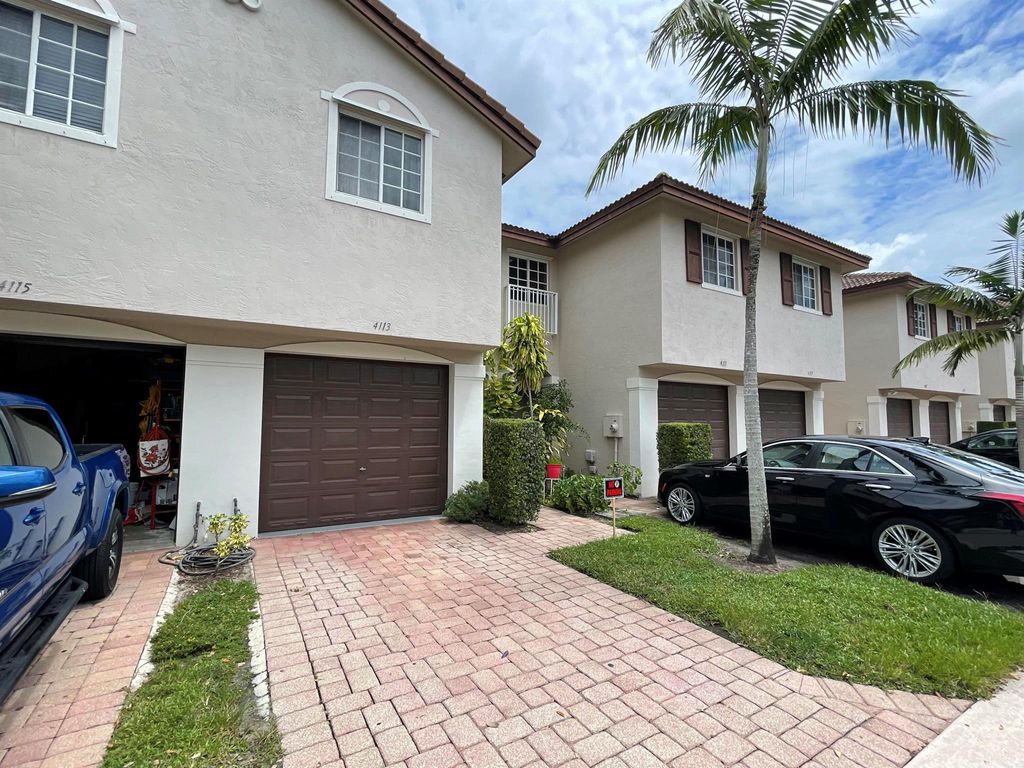 Photo of 4113 Napoli Lake Drive, Riviera Beach, FL 33410 (MLS # R10949048)