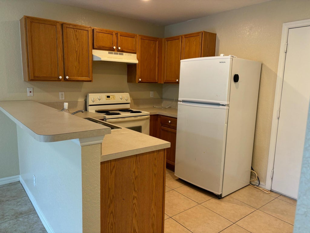 Photo of 5330 SE Mitchell Lane, Stuart, FL 34997 (MLS # B26053111)