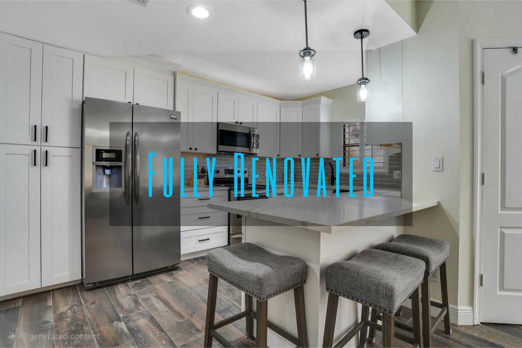 Photo of 66 Uno Lago Drive, Juno Beach, FL 33408 (MLS # R11052679)