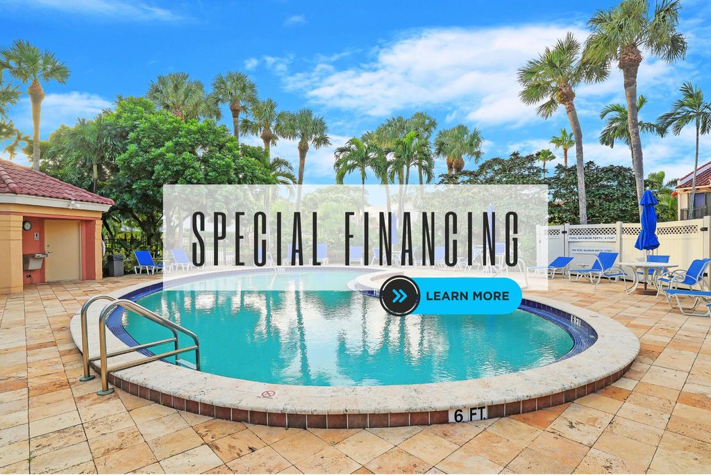 Photo of 66 Uno Lago Drive, Juno Beach, FL 33408 (MLS # R11052679)