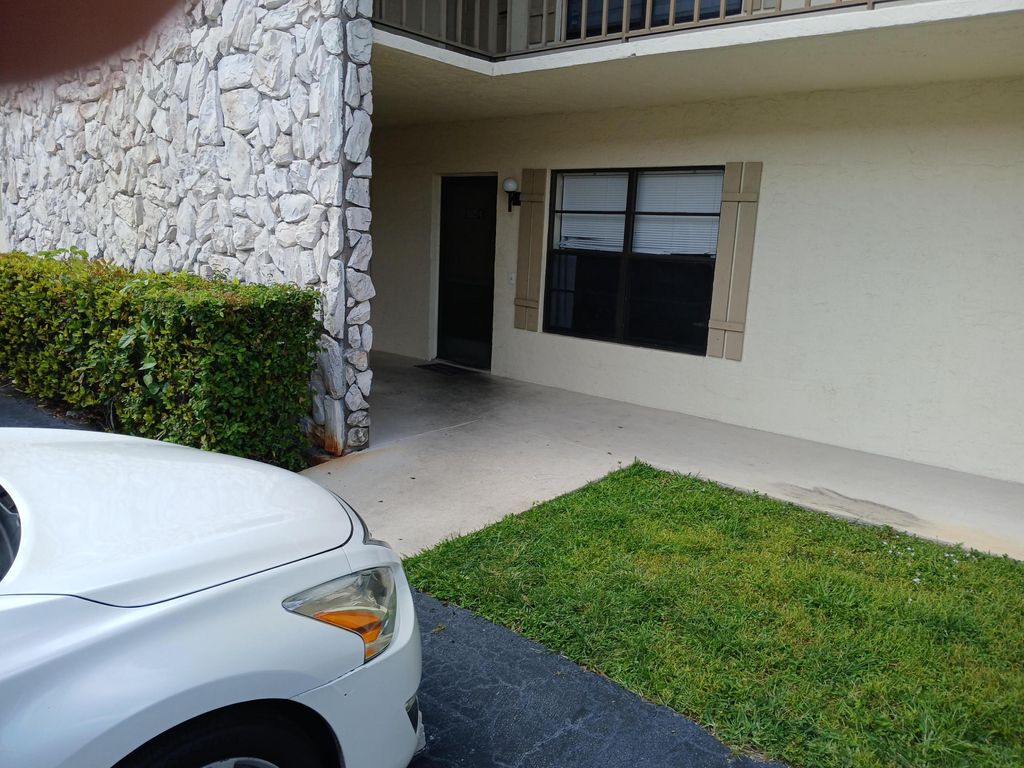 Photo of 5925 Longbow Lane #4, West Palm Beach, FL 33415 (MLS # B26012201)