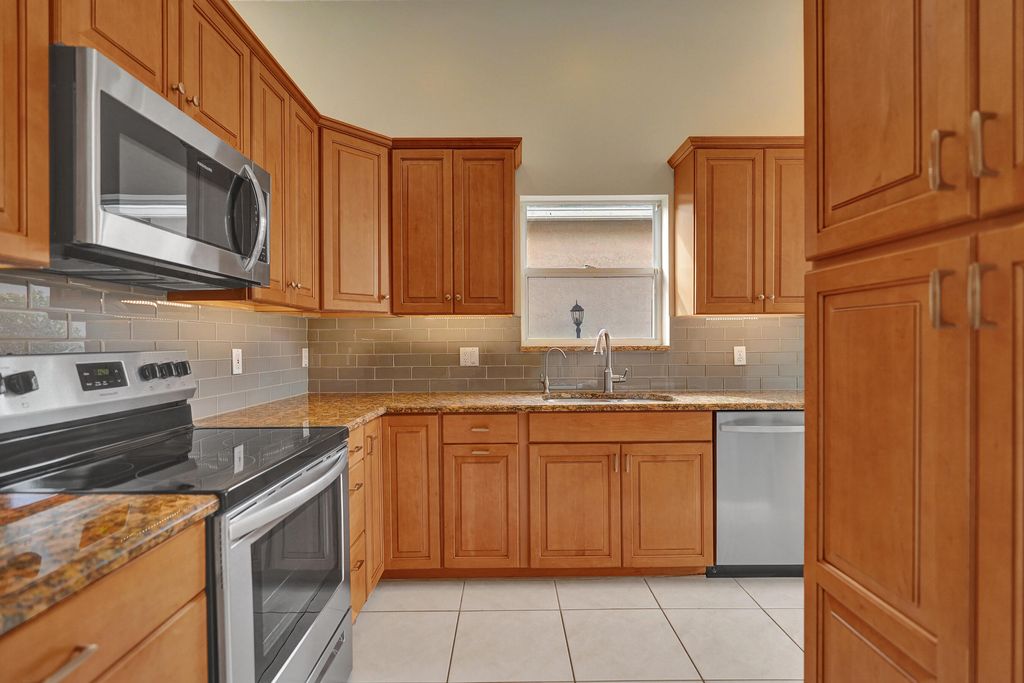 Photo of 16658 La Mesa Drive, Delray Beach, FL 33484 (MLS # R11158027)