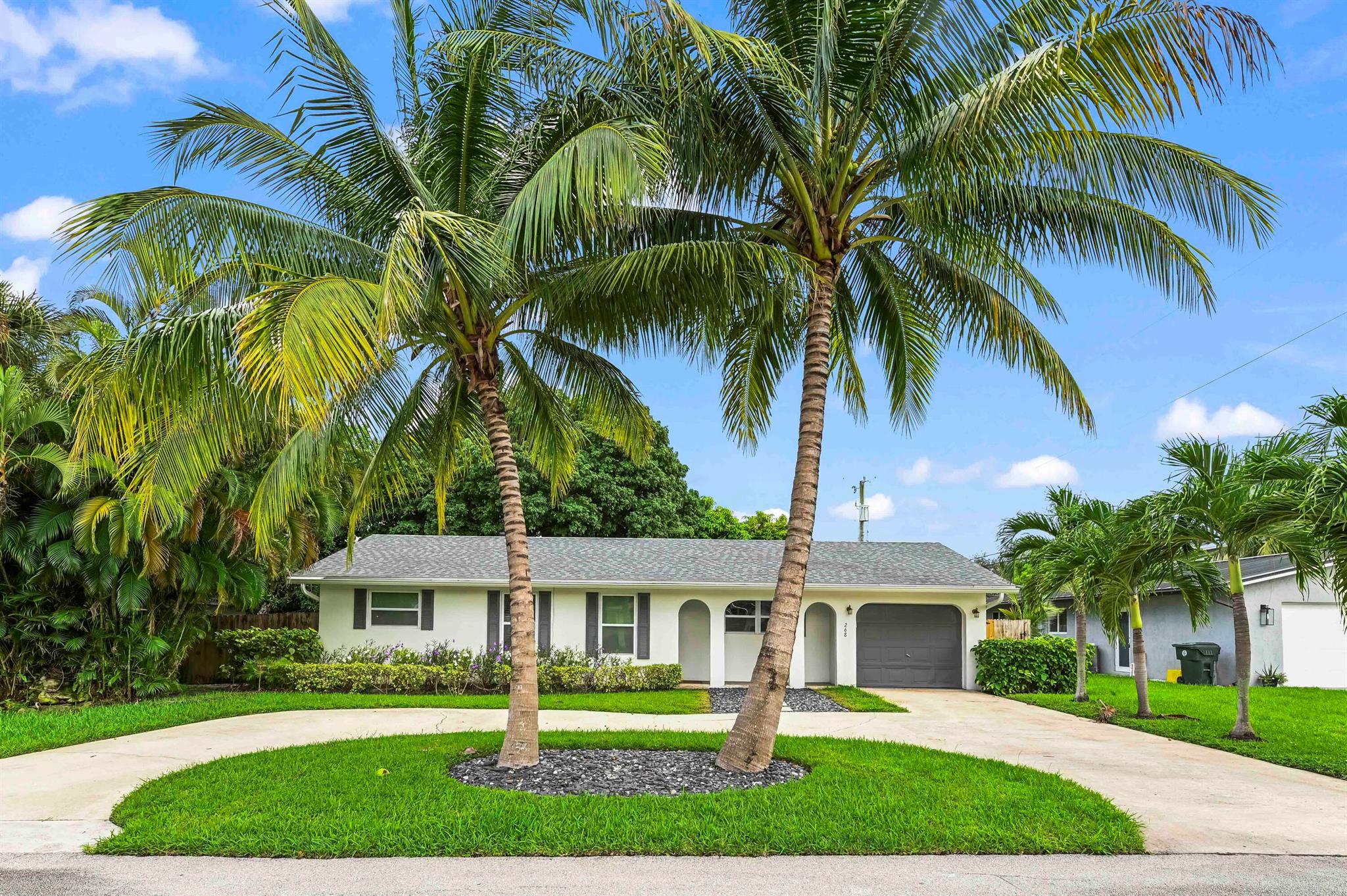 Charming 3 bed, 2 bath updated home for rent! Featuring a beautuful bright updated kitchen and renovated bathrooms, this home offers tile flooring throughout for easy maintenance. Enjoy a spacious, fully fenced yard--perfect for kids and pets--as well as an open patio ideal for outdoor grilling. Located just minutes from Mizner Park's shops and dining, and a short drive to the beach, this home offers comfort, convenience, and coastal living all in one. No pet, age, or Vehicle restrictions, No HOA! Don't miss this great rental opportunity!