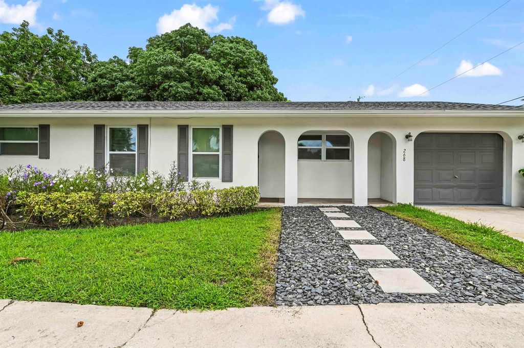 Photo of 268 NW 12th Street, Boca Raton, FL 33432 (MLS # R11122573)