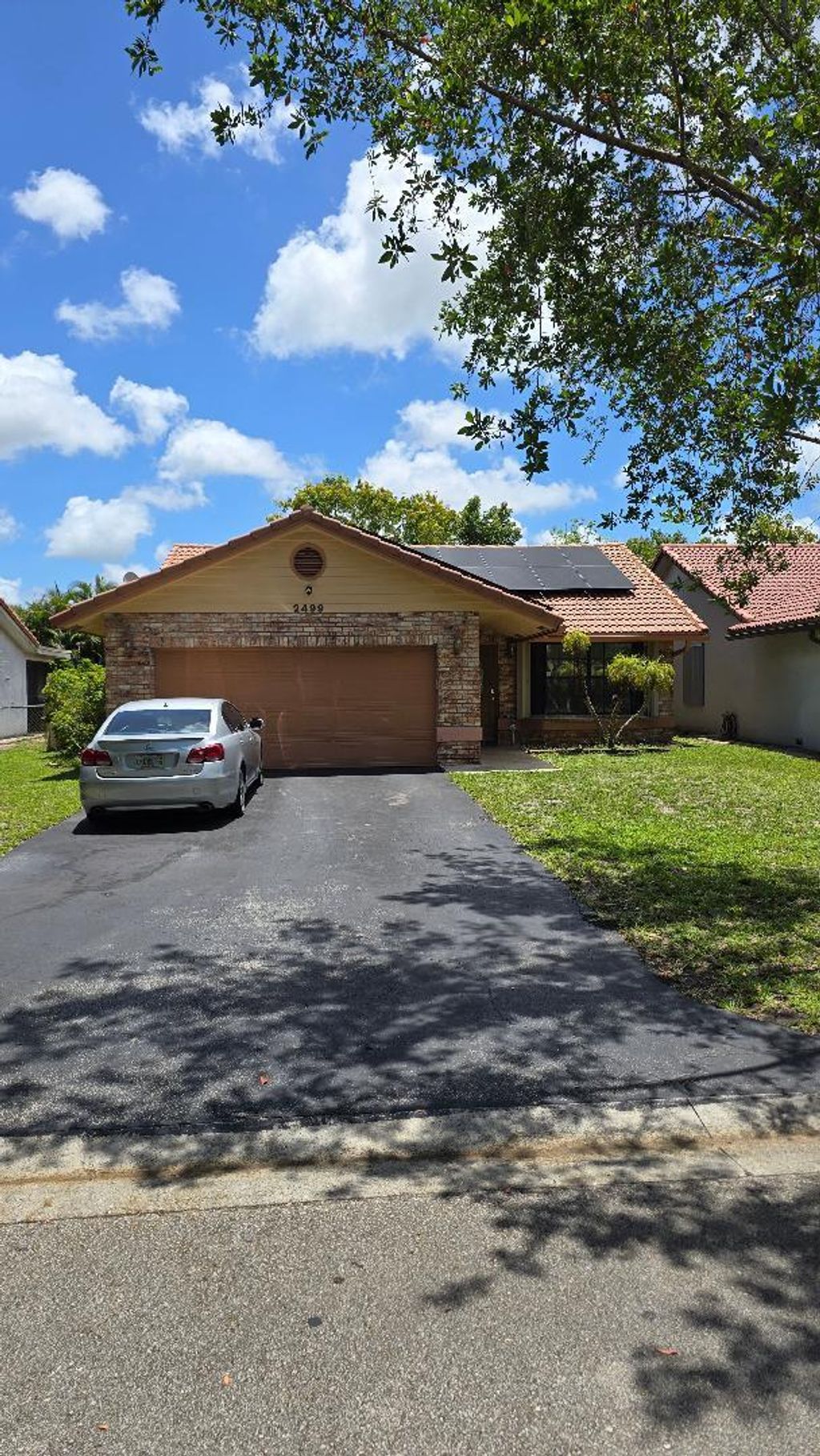 Photo of 2499 NW 92nd Avenue, Coral Springs, FL 33065 (MLS # B26032289)