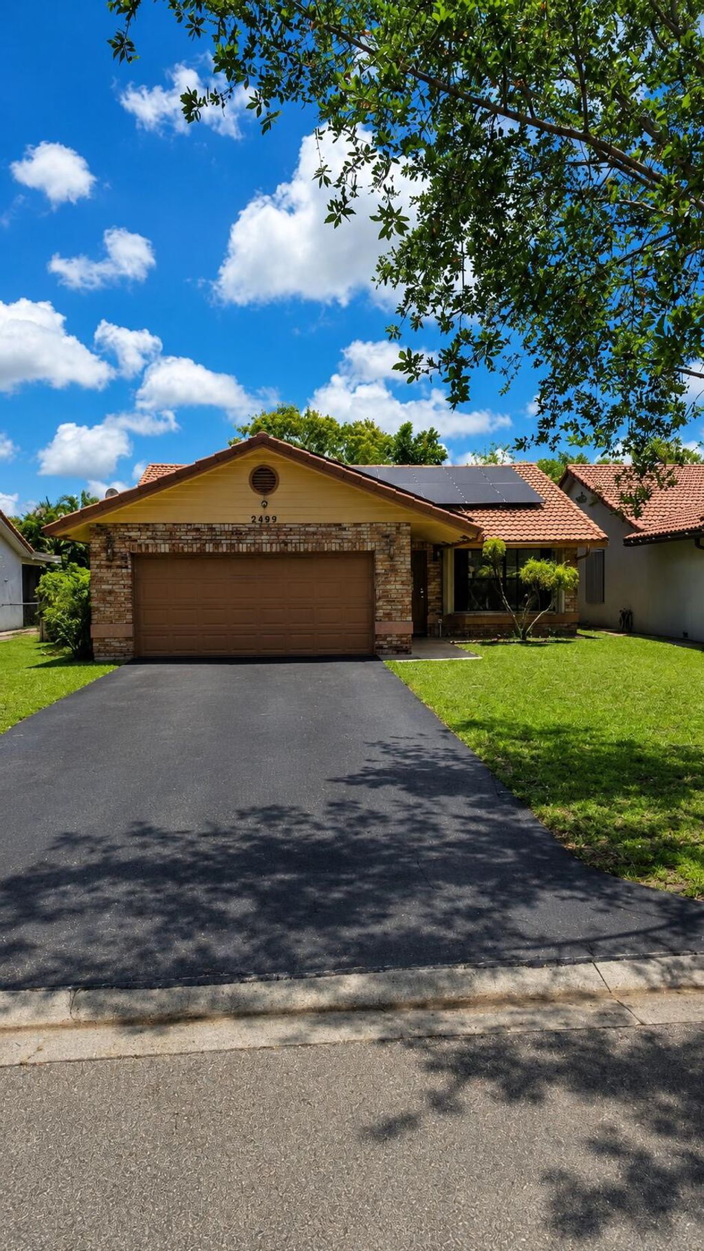 Photo of 2499 NW 92nd Avenue, Coral Springs, FL 33065 (MLS # B26032289)