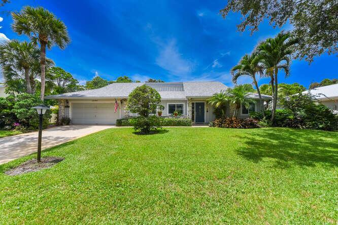 Located in Hobe Sound's best kept secret!! Eaglewood has incredible amenities including UNLIMITED FREE GOLF with no membership fee on a challenging 18 hole golf course, a fabulous heated pool with hot tub, tennis courts, pickleball, bocce court, club house with 19th Hole, chipping and putting green, a fully equipped work shop and a dog park for your furry friend's enjoyment. Golf cart included!! Nothing to do here but enjoy your retirement.