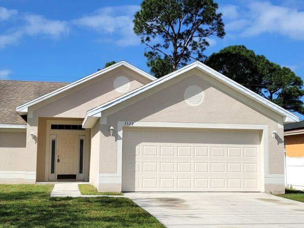 Photo of 3572 SW Savona Boulevard, Port Saint Lucie, FL 34953 (MLS # R11070990)