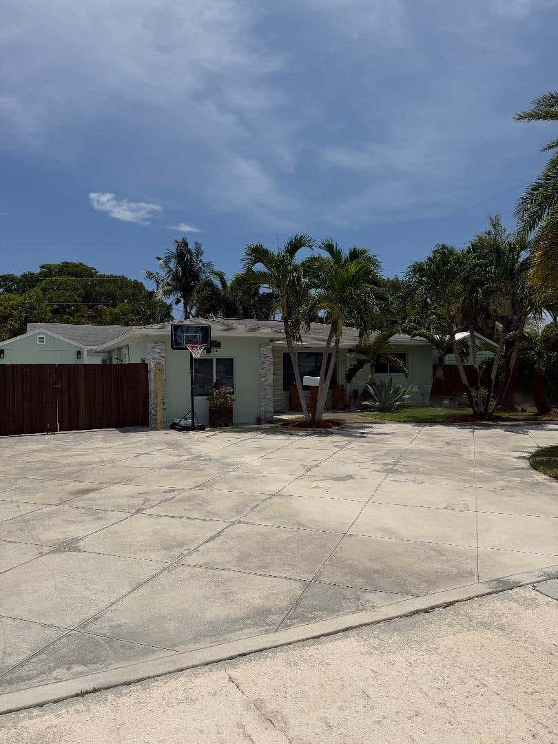 Photo of 819 6th Street, Lake Park, FL 33403 (MLS # B26056643)