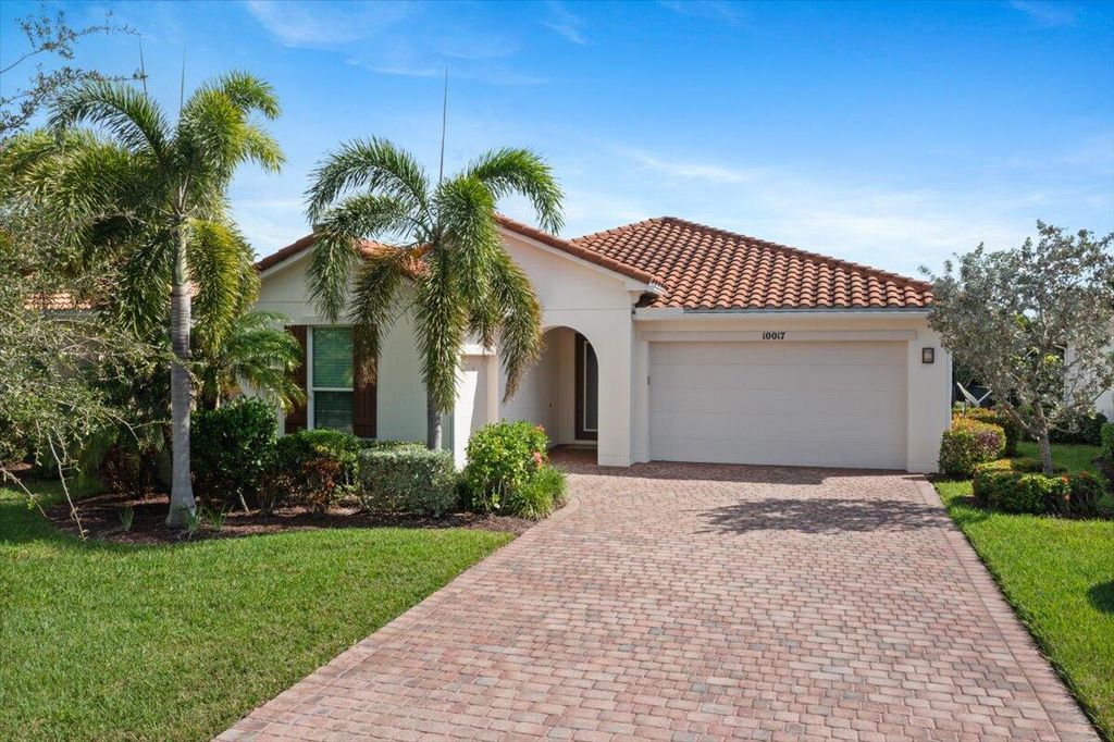 Photo of 10017 SW Oak Tree Circle, Port Saint Lucie, FL 34987 (MLS # R11083397)