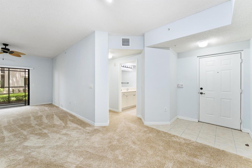 Photo of 3020 Alcazar Place #108, Palm Beach Gardens, FL 33410 (MLS # R11100138)