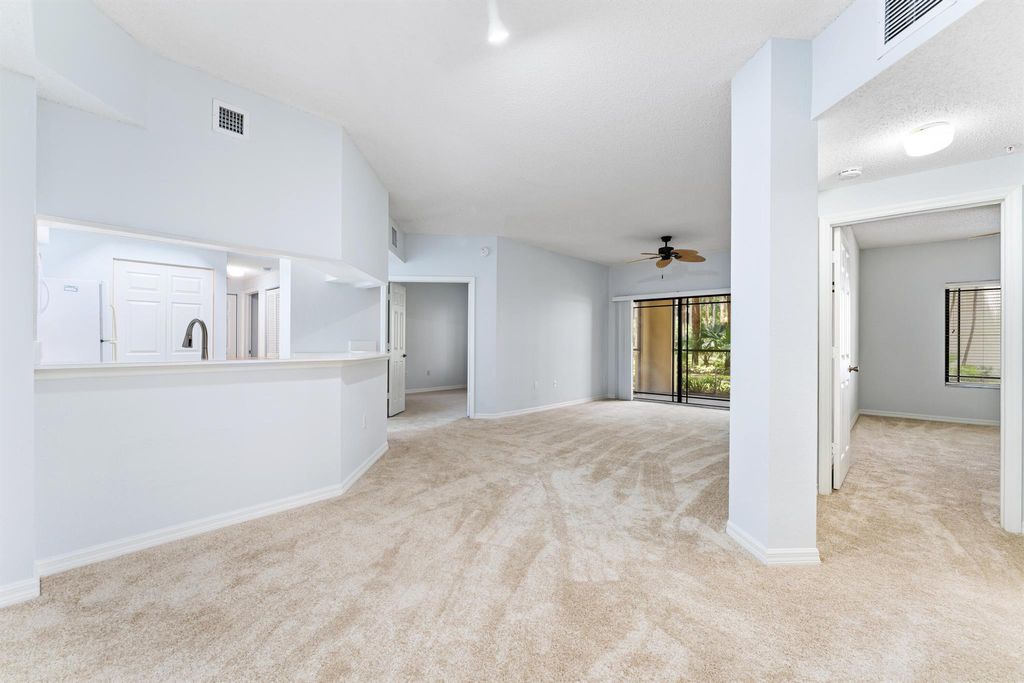 Photo of 3020 Alcazar Place #108, Palm Beach Gardens, FL 33410 (MLS # R11100138)