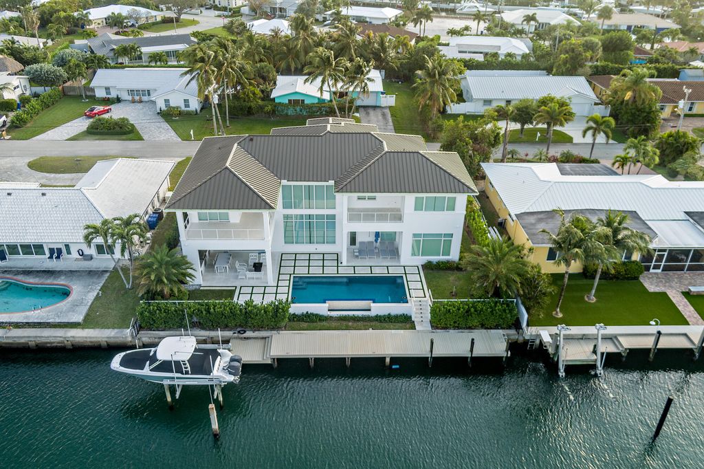 Photo of 1180 Bimini Lane, Riviera Beach, FL 33404 (MLS # R11050280)