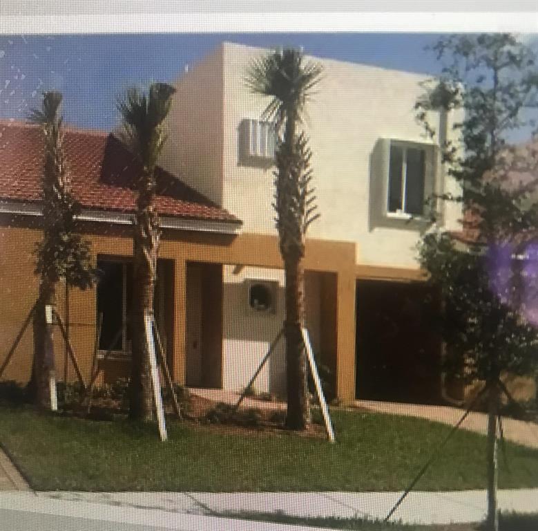 NIVE TOWNHOUSE IN THE MIDDLE OF LAKE WORT, CLOSE TO THE BEACH THE STATE COLLEGE AND LAKE WORTH DOWNTOWN. GREAT OPEN SPACE WITH TILES IN THE FIRST FLOOR, AND RUGS UPSTAIRS. MASTER IS ON THE FIRST FLOOR.