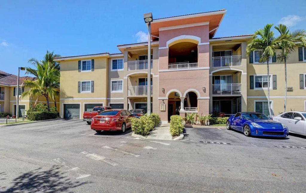 Photo of 6565 Emerald Dunes Drive #301, West Palm Beach, FL 33411 (MLS # F10528317)