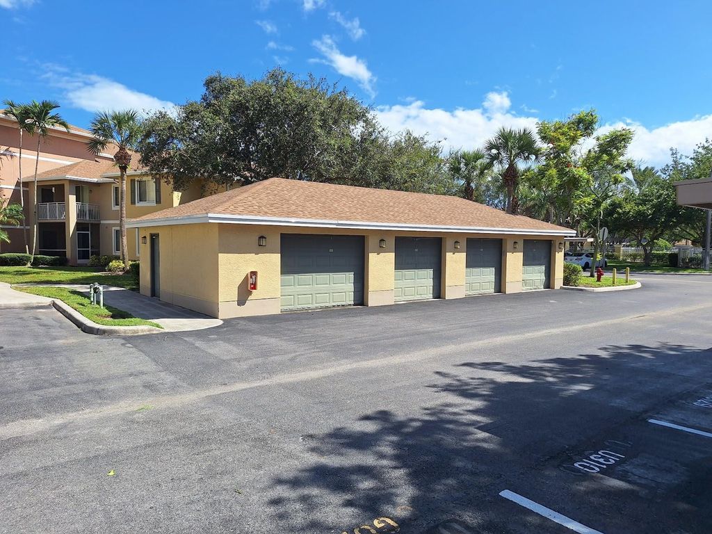 Photo of 6565 Emerald Dunes Drive #301, West Palm Beach, FL 33411 (MLS # F10528317)