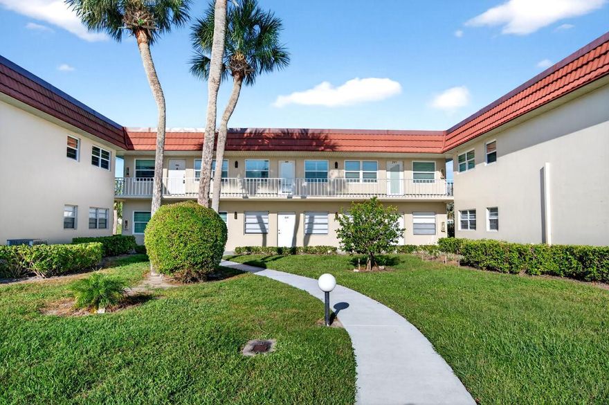 Welcome to effortless Florida living in this beautifully maintained, turnkey-furnished second-floor condo in the highly sought-after Vista Royale 55+ golf community. Located at 108 Springlake Drive Unit 203, this move-in-ready residence offers serene golf course views, resort-style amenities, and the perfect blend of comfort and convenience