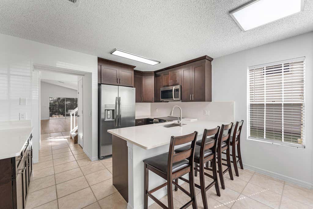 Photo of 5601 Berry Blossom Way W, West Palm Beach, FL 33415 (MLS # B26058446)