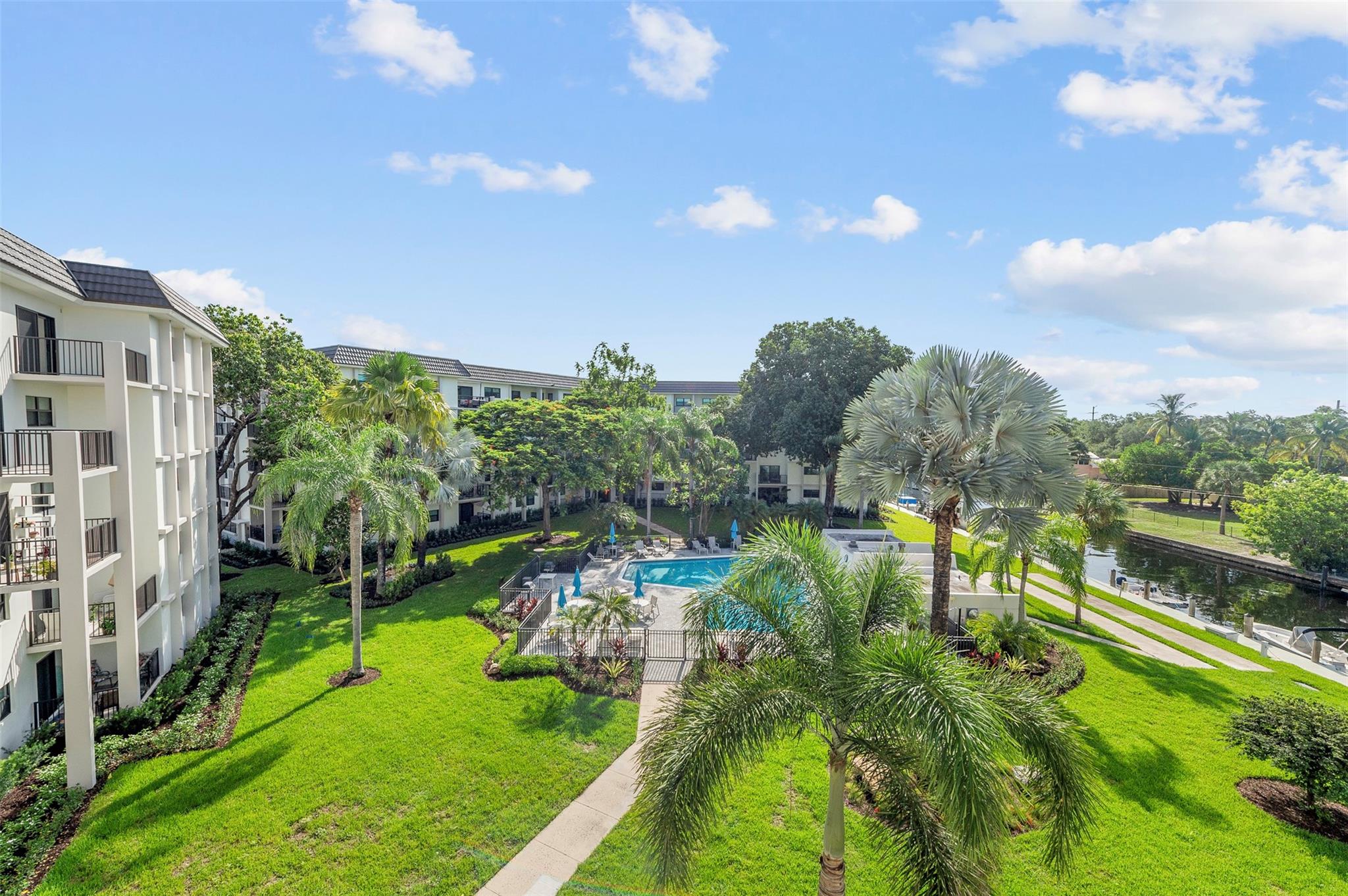 Welcome to River Reach, a gated island community on the New River in Fort Lauderdale. This beautifully maintained 2BR/1.5BA on the 4th floor features a bright open layout, in-unit washer/dryer, updated finishes, and a large balcony with pool and canal views. Ready to move in! Rent includes water, cable & internet. Amenities: 3 heated pools, tennis & pickleball courts, gym, clubhouse, library, kayak launch & riverfront paths. Secured with 24-hour manned security and plenty of guest parking. Minutes to Las Olas, downtown, beaches, airport & highways. NO PETS