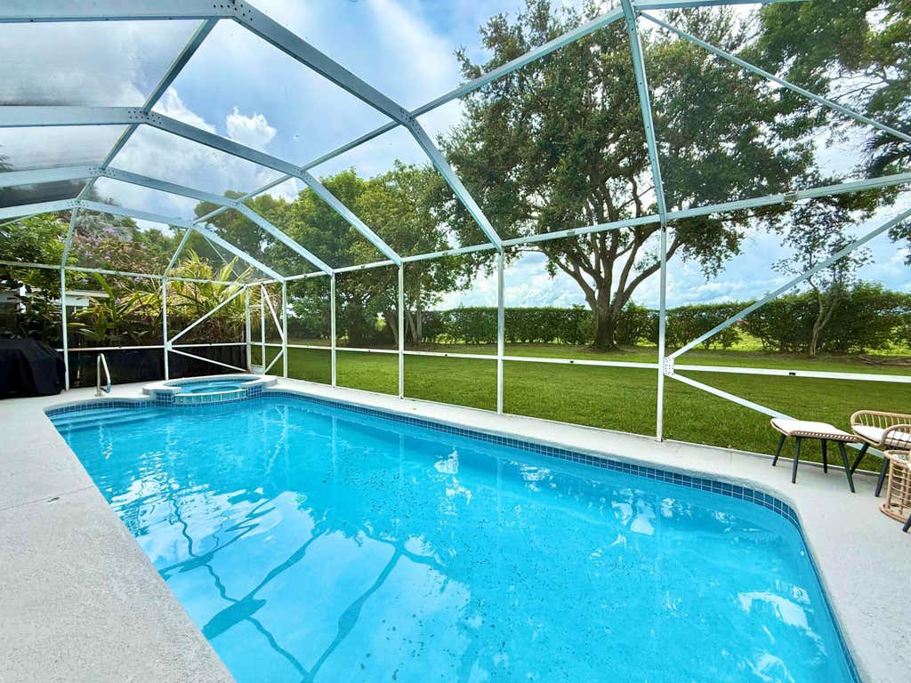 Photo of 10875 Old Bridgeport Lane, Boca Raton, FL 33498 (MLS # B26049735)