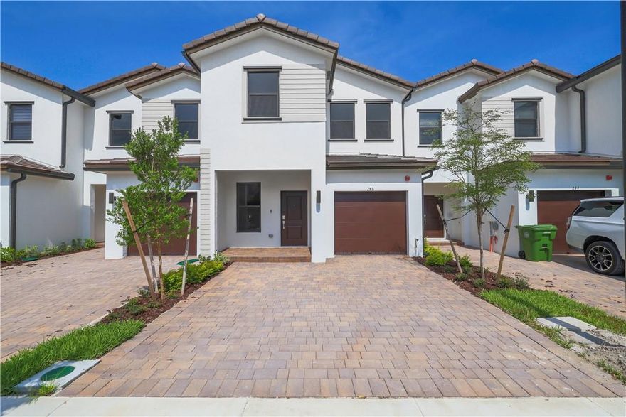 PRICED $20,000 UNDER LENNAR'S SALE PRICE FOR THIS MODEL! Absolutely brand new 3/2.5 townhouse with great upgrades in the new community of Sunset Pines, is ready for you to make it your new home! This home has never been lived in!! Top-of-the-line stainless steel appliances, quartz countertops, tankless water heater, Ring doorbell, and security system, and tile throughout the main floor. The property has an attached one-car garage and a two-car driveway, and an enclosed backyard for your privacy. The location is fantastic with superb schools, shopping, parks, and dining close by and just minutes away from the Turnpike and I-75. A luxurious clubhouse with a resort-style pool and cabanas will be available for residents to enjoy as well.