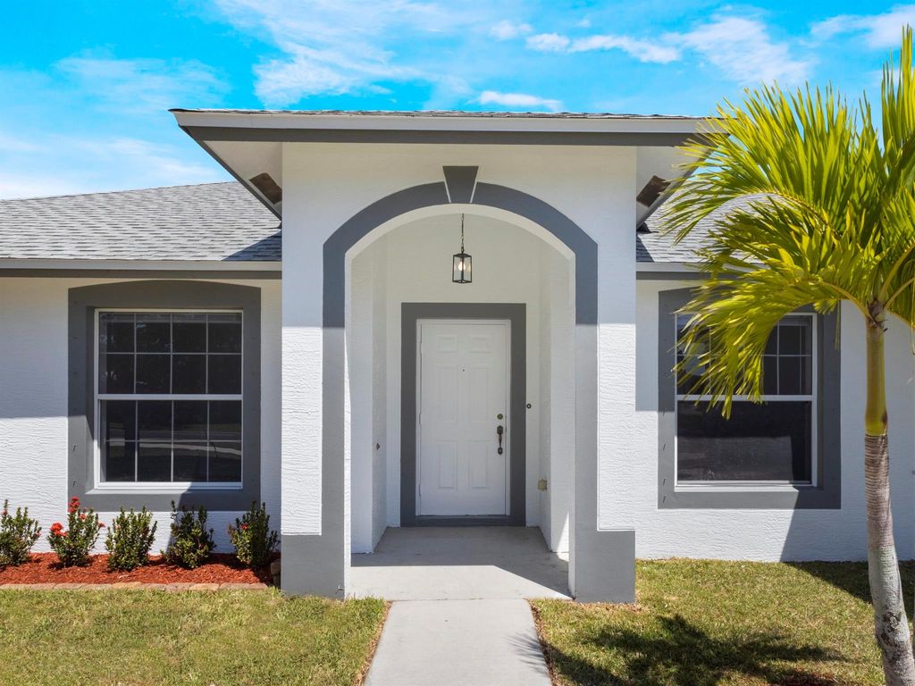 Photo of 1201 SW Paar Drive, Port Saint Lucie, FL 34953 (MLS # R11081669)