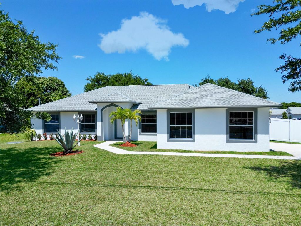 Photo of 1201 SW Paar Drive, Port Saint Lucie, FL 34953 (MLS # R11081669)