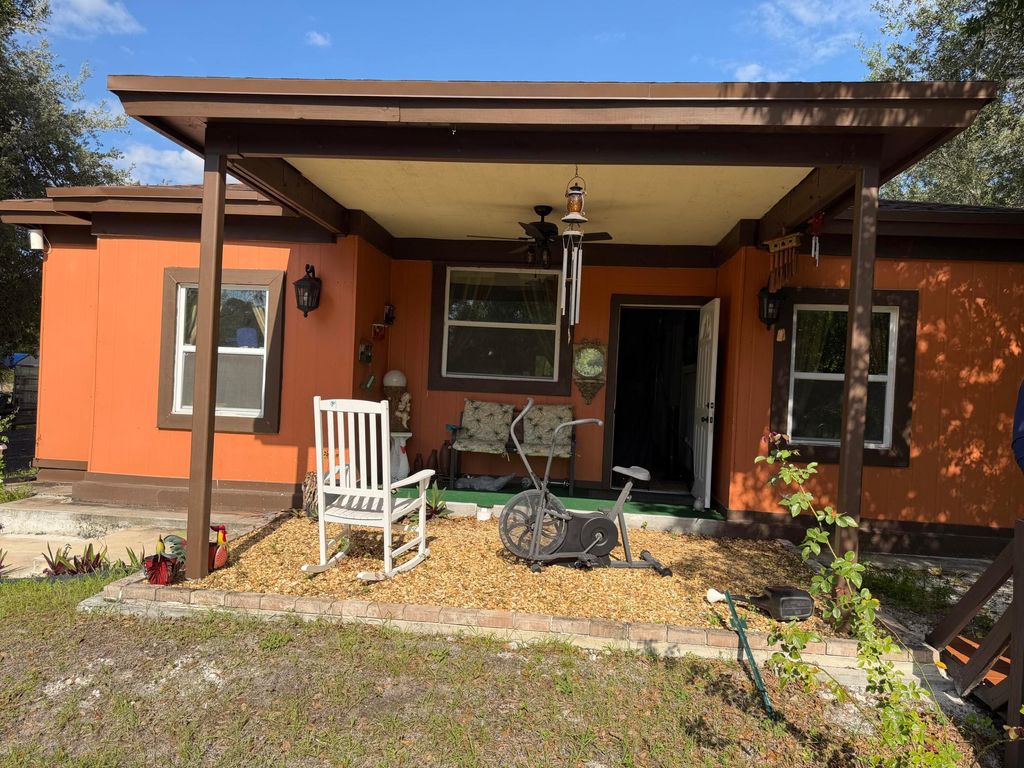 Photo of 235 N Sendero Street, Clewiston, FL 33440 (MLS # B26017409)